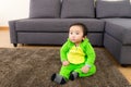 Asian Baby with dinosaur halloween party costume