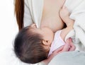 Asian baby drinking breastmilk Royalty Free Stock Photo