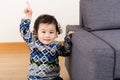 Asian baby finger pointing up