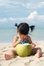 Asian baby girl on beach Royalty Free Stock Photo