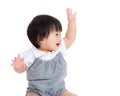 Asian baby girl greeting with hand up