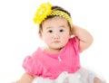Asian baby girl scratching her head Royalty Free Stock Photo