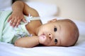 Asian baby girl sucking her thumb Royalty Free Stock Photo