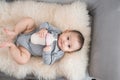 Asian baby infant eating milk from bottle, 9 months after birth Royalty Free Stock Photo