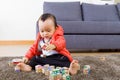 Asian baby playing wooden block Royalty Free Stock Photo