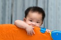 Asian baby in playpen Royalty Free Stock Photo