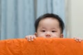 Asian baby in playpen Royalty Free Stock Photo