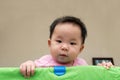 Asian baby in playpen Royalty Free Stock Photo