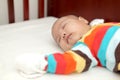 Asian Baby Sleeping on the baby crib Royalty Free Stock Photo