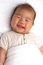 Asian baby smiling Royalty Free Stock Photo