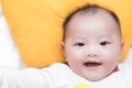 Asian baby smiling Royalty Free Stock Photo