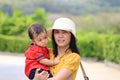 Asian baby travels with his mother on holiday Royalty Free Stock Photo