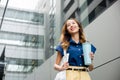 Business woman confident smiling with cloth bag holding steel thermos tumbler mug water glass Royalty Free Stock Photo