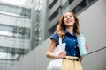 business woman confident smiling with cloth bag holding steel thermos tumbler mug water glass Royalty Free Stock Photo