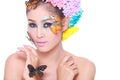 Asian Beautiful Girl With colorful make up with fresh Flowers and Butterfly Royalty Free Stock Photo