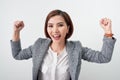 Asian beautiful girl feel happy. smiling woman show hand up successful sign action Royalty Free Stock Photo