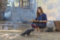 Asian beautiful girl winnowing rice separate between rice and rice husk