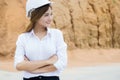 Asian beautiful lady land agent surveying land for build industrial  factory project Royalty Free Stock Photo