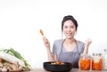 Asian beautiful woman Cooking kimchi Is a Korean fermented food made from vegetables Royalty Free Stock Photo