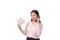 Asian beautiful woman holding banknote money in hand and mobile phone in another hand isolated on white background , clipping path Royalty Free Stock Photo