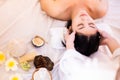 Asian Beautiful, young and healthy woman in spa salon. Massage treatment spa room . Traditional medicine and healing concept