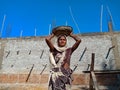 Asian beauty working on building construction site in India January 2020 Royalty Free Stock Photo