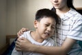 Asian big sister was embracing,comforting little brother,give advice,talk sharing thoughts care,support,loving teen girl speak Royalty Free Stock Photo