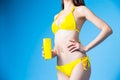 Asian bikini girl take sunscreen Royalty Free Stock Photo