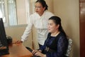 Asian blind person woman using computer with screen readers the assistive technology software program for people with vision