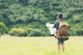 Asian boy backpack checking map in jungle forest, trips adventure and tourism for destination and leisure for education and relax Royalty Free Stock Photo