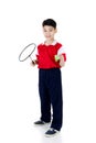 Asian boy in badminton action Royalty Free Stock Photo