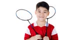 Asian boy in badminton action Royalty Free Stock Photo