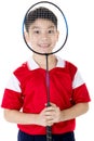 Asian boy in badminton action Royalty Free Stock Photo