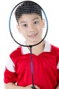 Asian boy in badminton action Royalty Free Stock Photo