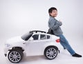 Asian boy car toy