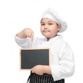Asian boy chef in uniform cook holding blackboard Royalty Free Stock Photo