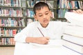 Asian boy doing homework . Royalty Free Stock Photo