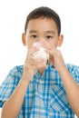 Asian boy drinking milk Royalty Free Stock Photo