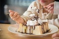 Asian boy eating honey toast Royalty Free Stock Photo