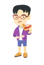 Asian boy eating tasty pizza. Royalty Free Stock Photo