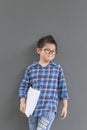 Asian boy feels excited when time to school and his hands hold the book Royalty Free Stock Photo