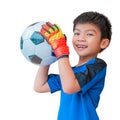 Asian boy a football goalkeeper wearing gloves and holding a soccer ball for youth sport concept isolated on white Royalty Free Stock Photo