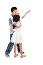 Asian boy and girl dancing together on white Royalty Free Stock Photo
