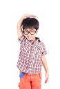 Asian boy growing tall and measuring himself Royalty Free Stock Photo