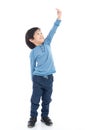 Asian Boy growing tall and measuring himself Royalty Free Stock Photo