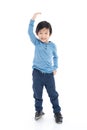 Asian Boy growing tall and measuring himself Royalty Free Stock Photo