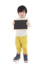 Asian boy holding black board on white background isolated Royalty Free Stock Photo