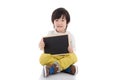 Asian boy holding black board on white background isolated Royalty Free Stock Photo