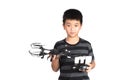 Asian boy holding drone and radio remote control handset for helicopter, drone or plane, isolated on white background, clipping Royalty Free Stock Photo
