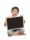 Asian boy holding empty chalkboard Royalty Free Stock Photo